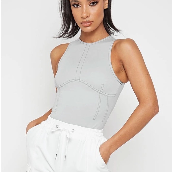 Maniere de Voir Tops - MANIERE DE VOIR Body suit with accent stitching XS